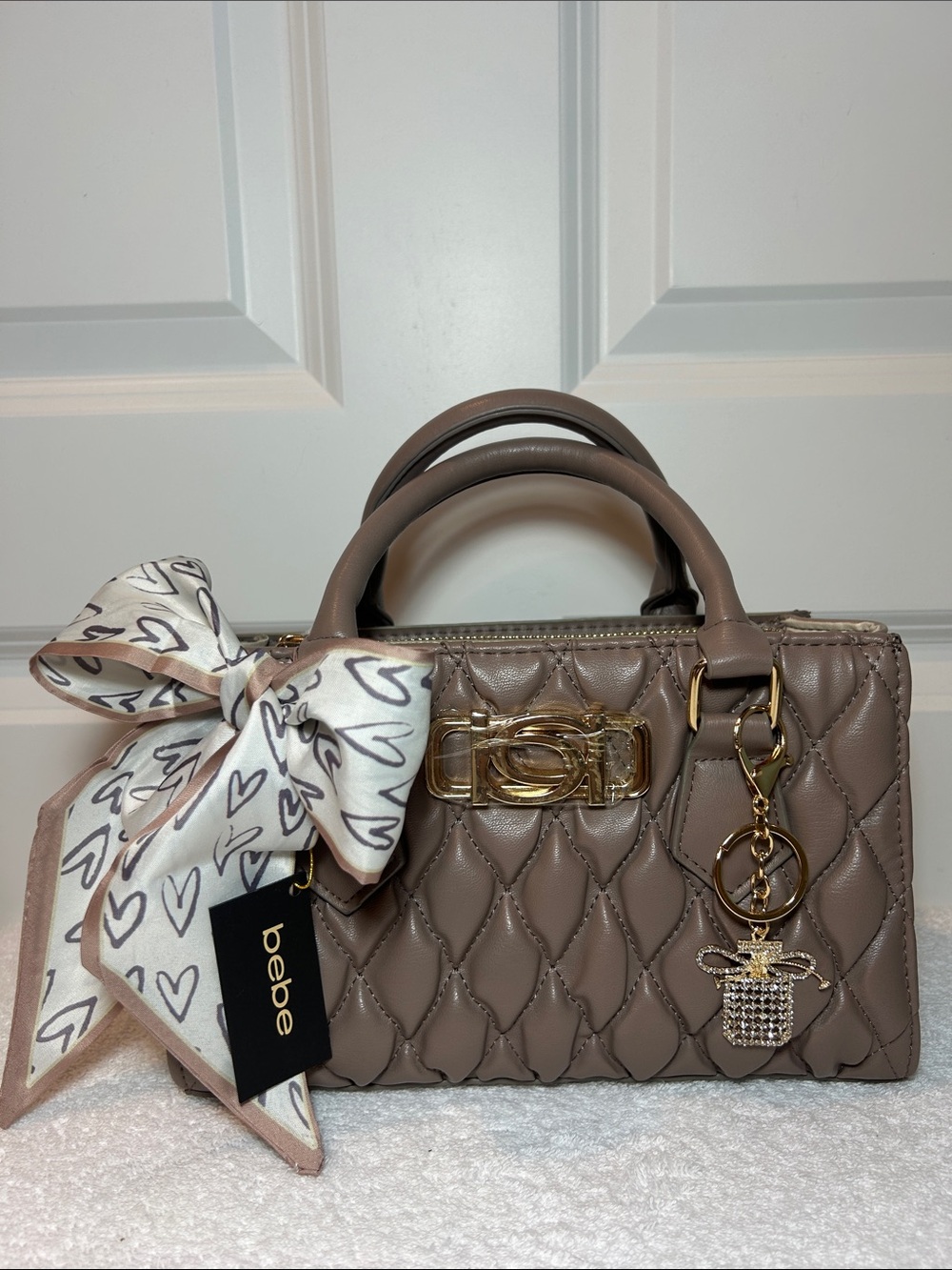 bebe Quilted Taupe Satchel with Bow and Gold Hardware